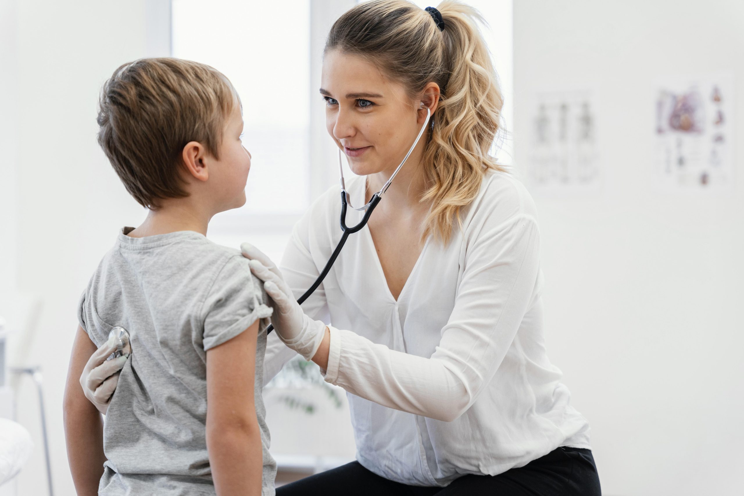 medium-shot-doctor-checking-kid